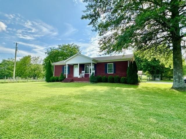 2244 Baptist Branch Rd, Mount Pleasant, TN 38474 - ranch-style home with a front lawn and a porch