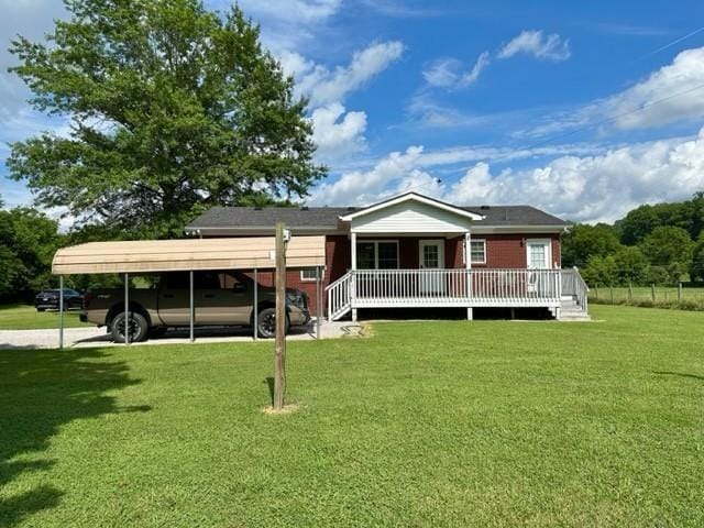 2244 Baptist Branch Rd, Mount Pleasant, TN 38474 - rear view of property with a yard and a detached carport