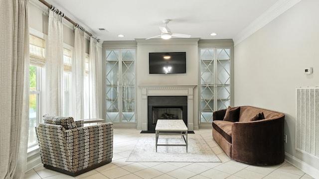 2976 Kingston Cir S, Mount Juliet, TN 37122 - living area with a heating unit, ornamental molding, a ceiling fan, a fireplace, and tile patterned flooring