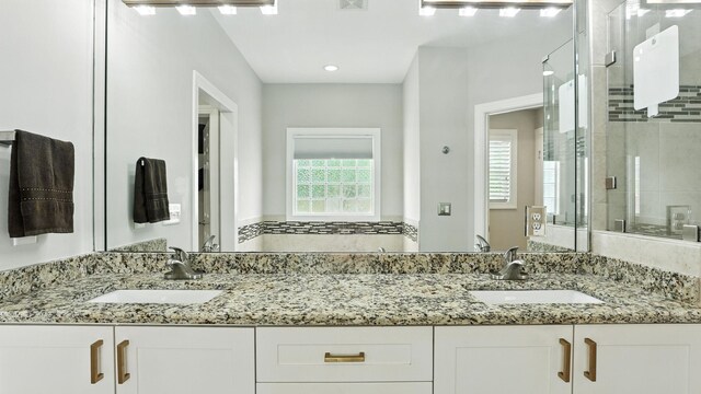 2976 Kingston Cir S, Mount Juliet, TN 37122 - bathroom featuring double vanity, a stall shower, and recessed lighting