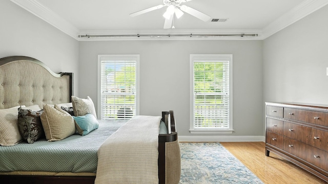 2976 Kingston Cir S, Mount Juliet, TN 37122 - bedroom featuring crown molding, light wood-style floors, and a ceiling fan