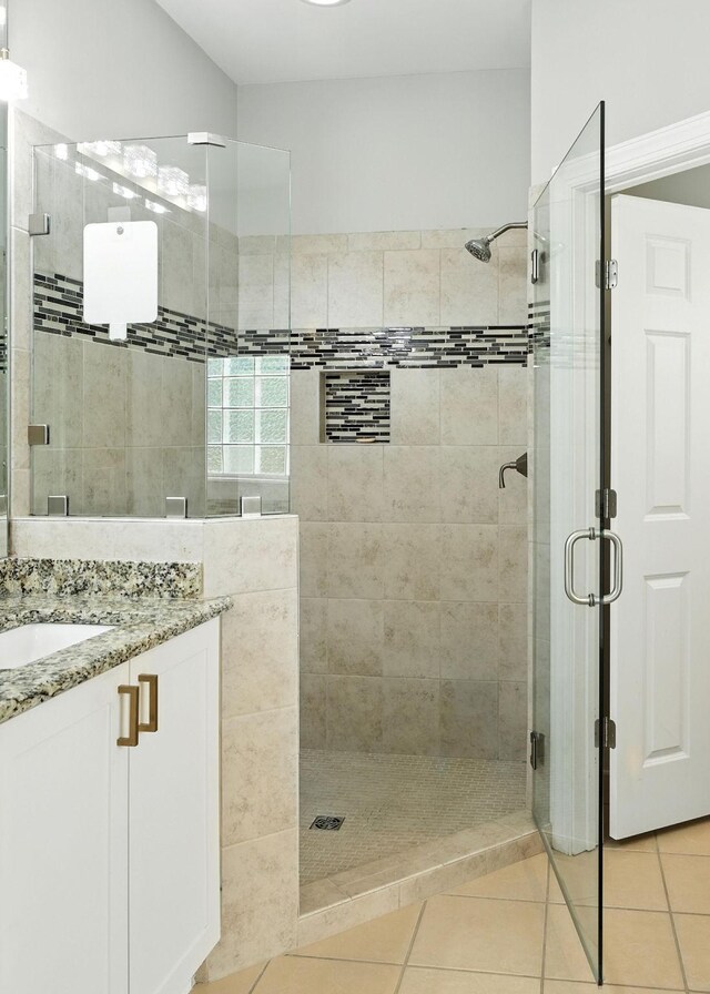 2976 Kingston Cir S, Mount Juliet, TN 37122 - bathroom with vanity, a stall shower, and tile patterned flooring