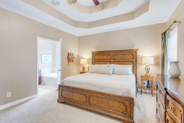 5019 John Hagar Rd, Hermitage, TN 37076 - bedroom with light colored carpet, ensuite bathroom, a raised ceiling, a ceiling fan, and crown molding
