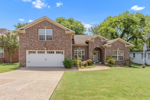 5019 John Hagar Rd, Hermitage, TN 37076 - traditional-style home with brick siding, concrete driveway, a front yard, and an attached garage