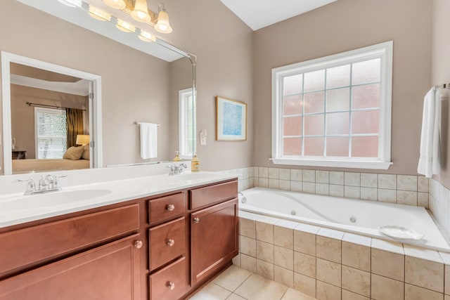 5019 John Hagar Rd, Hermitage, TN 37076 - ensuite bathroom with double vanity, a jetted tub, and tile patterned floors
