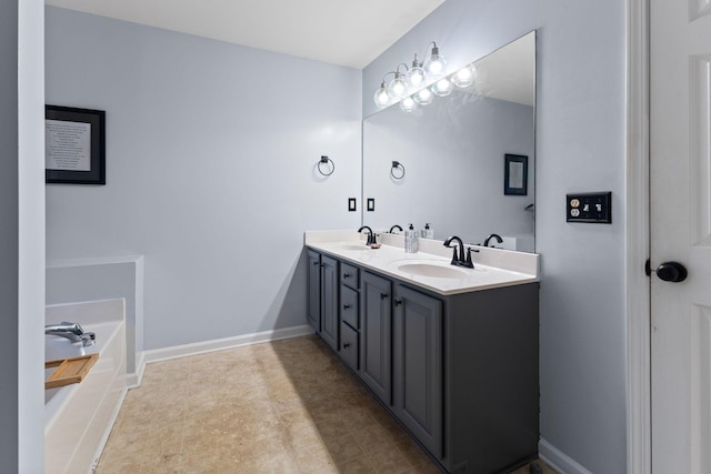 2684 Wind Dance Ct, Spring Hill, TN 37174 - bathroom with double vanity and a garden tub