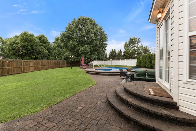 2684 Wind Dance Ct, Spring Hill, TN 37174 - fenced backyard with a patio area