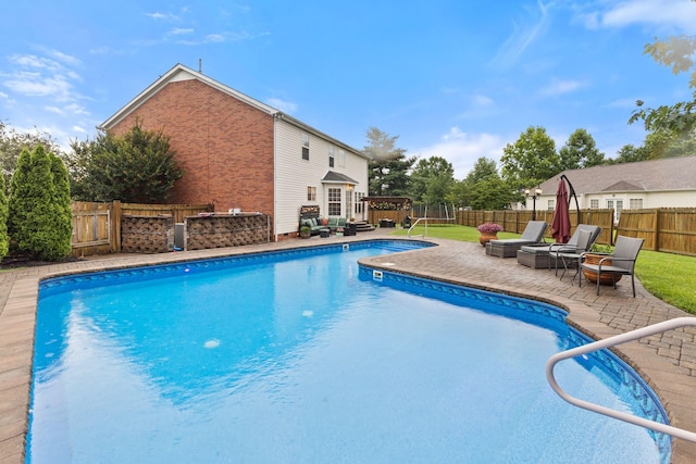 2684 Wind Dance Ct, Spring Hill, TN 37174 - view of pool with a fenced backyard, a patio, and a wooden deck