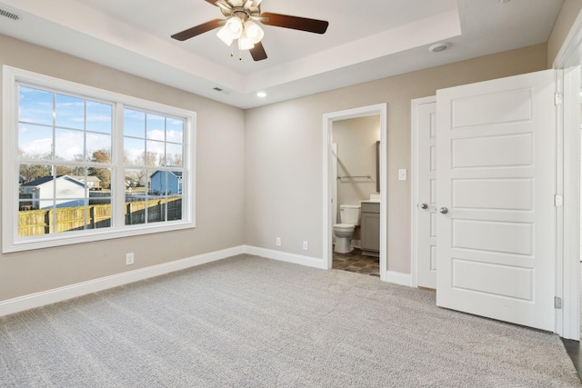 413 Stein St, Oak Grove, KY 42262 - unfurnished bedroom with carpet flooring, a tray ceiling, recessed lighting, ensuite bathroom, and a ceiling fan