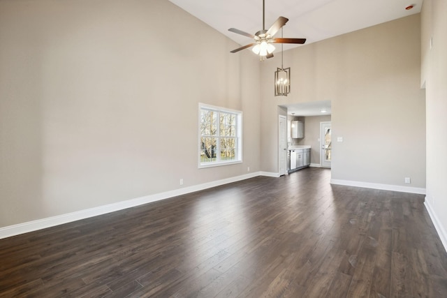 413 Stein St, Oak Grove, KY 42262 - unfurnished living room featuring ceiling fan, dark wood-type flooring, and high vaulted ceiling
