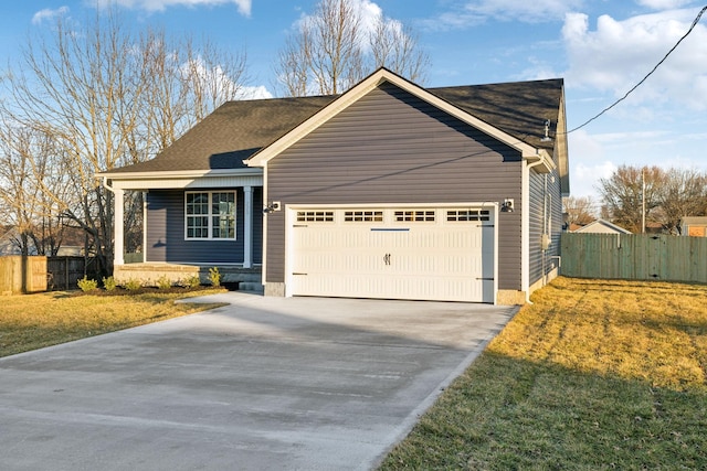 413 Stein St, Oak Grove, KY 42262 - view of front of property with a garage, driveway, roof with shingles, and covered porch