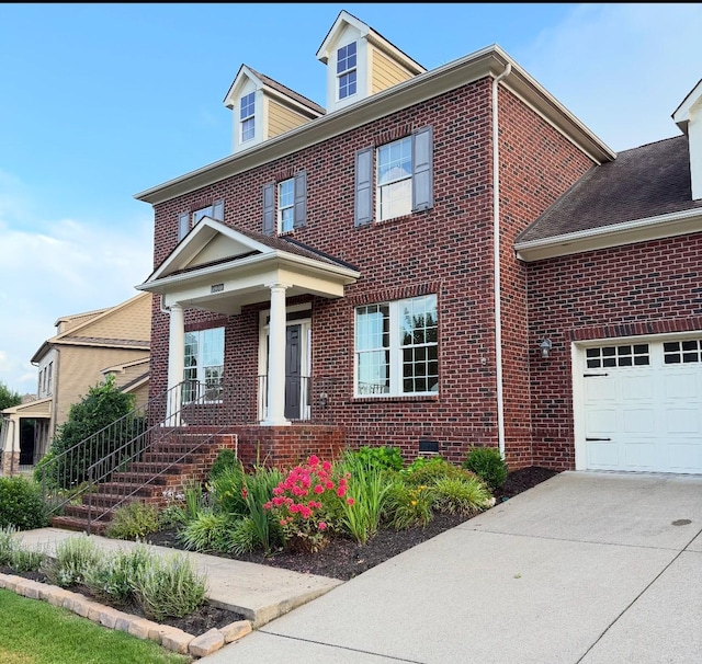 5990 Fishing Creek Rd, Nolensville, TN 37135 - view of front of home featuring brick siding, covered porch, and driveway