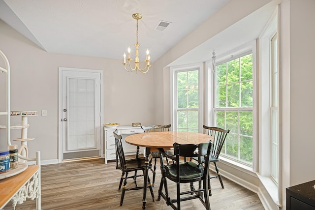 2106 Debbie Ln, La Vergne, TN 37086 - dining space with plenty of natural light, light wood-type flooring, and a chandelier