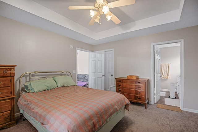 2106 Debbie Ln, La Vergne, TN 37086 - carpeted bedroom with a raised ceiling, a ceiling fan, and connected bathroom