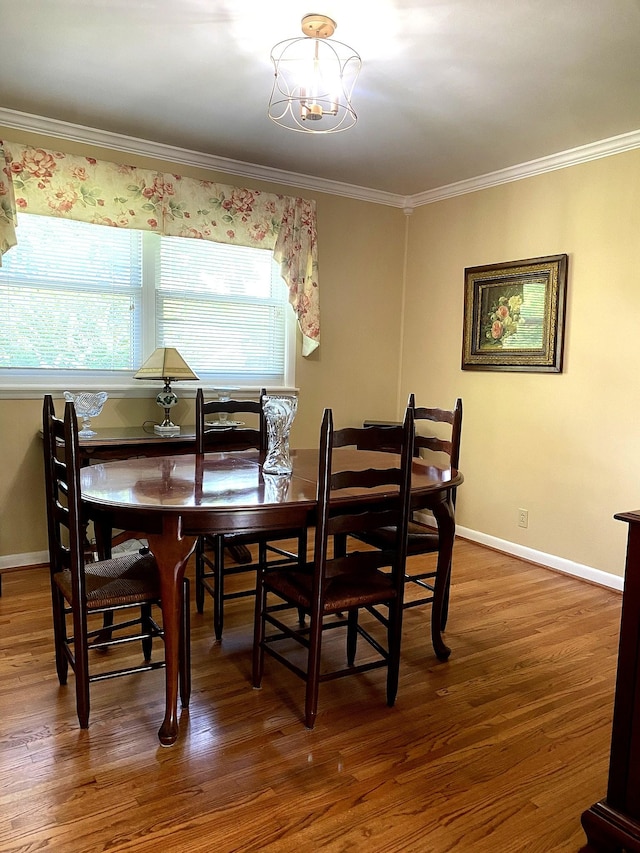 521 Columbus Dr, Hermitage, TN 37076 - dining area featuring ornamental molding, wood finished floors, and a chandelier