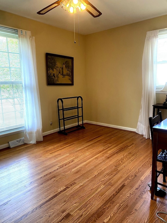 521 Columbus Dr, Hermitage, TN 37076 - unfurnished room featuring a ceiling fan, wood finished floors, and plenty of natural light