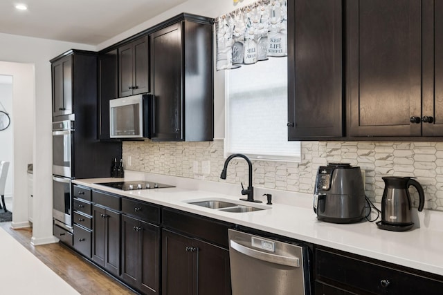 809 Old Blue Ln, Murfreesboro, TN 37130 - kitchen featuring stainless steel appliances, light countertops, backsplash, and light wood-type flooring