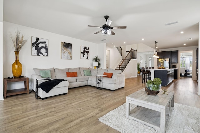 809 Old Blue Ln, Murfreesboro, TN 37130 - living area featuring stairs, light wood finished floors, recessed lighting, and a ceiling fan