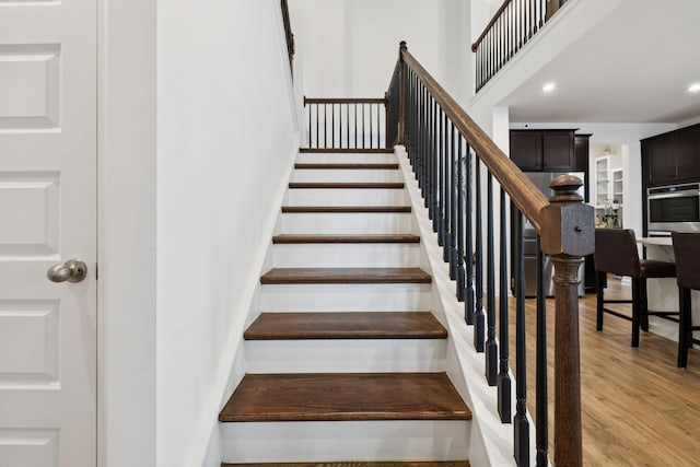 809 Old Blue Ln, Murfreesboro, TN 37130 - stairs with wood finished floors, recessed lighting, and a towering ceiling