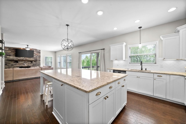 1197 Upland Ter, Clarksville, TN 37043 - kitchen with a kitchen island, backsplash, white cabinetry, and recessed lighting
