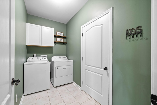 1197 Upland Ter, Clarksville, TN 37043 - laundry room with cabinet space, separate washer and dryer, and light tile patterned floors