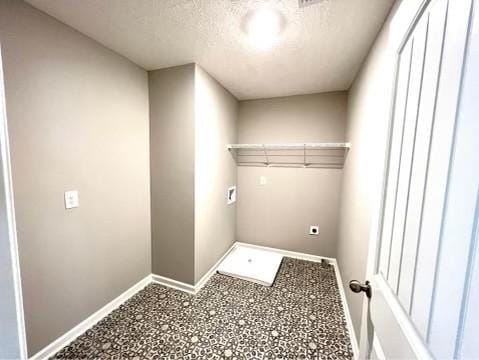 5225 Normandy Cob Dr Unit 33, Murfreesboro, TN 37129 - laundry area featuring electric dryer hookup and a textured ceiling