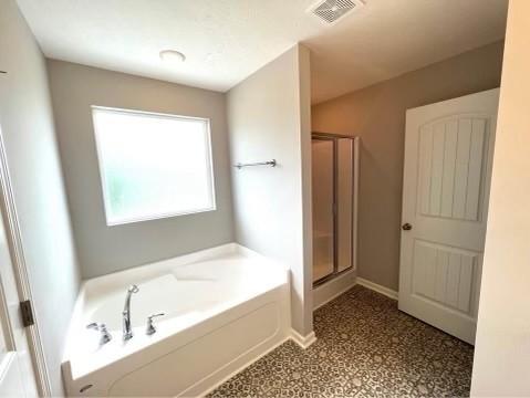 5225 Normandy Cob Dr Unit 33, Murfreesboro, TN 37129 - bathroom featuring a shower stall and a garden tub