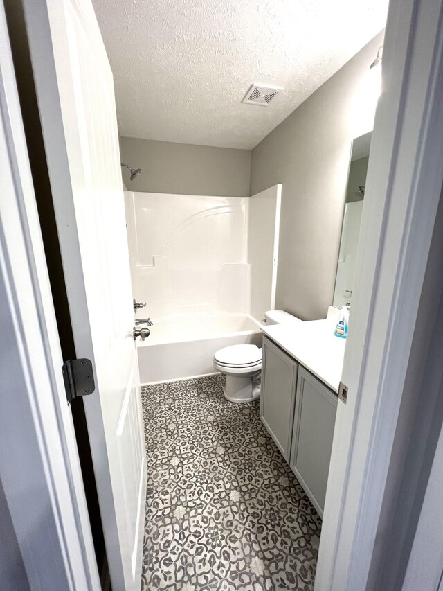 5225 Normandy Cob Dr Unit 33, Murfreesboro, TN 37129 - full bathroom with vanity,  shower combination, and a textured ceiling