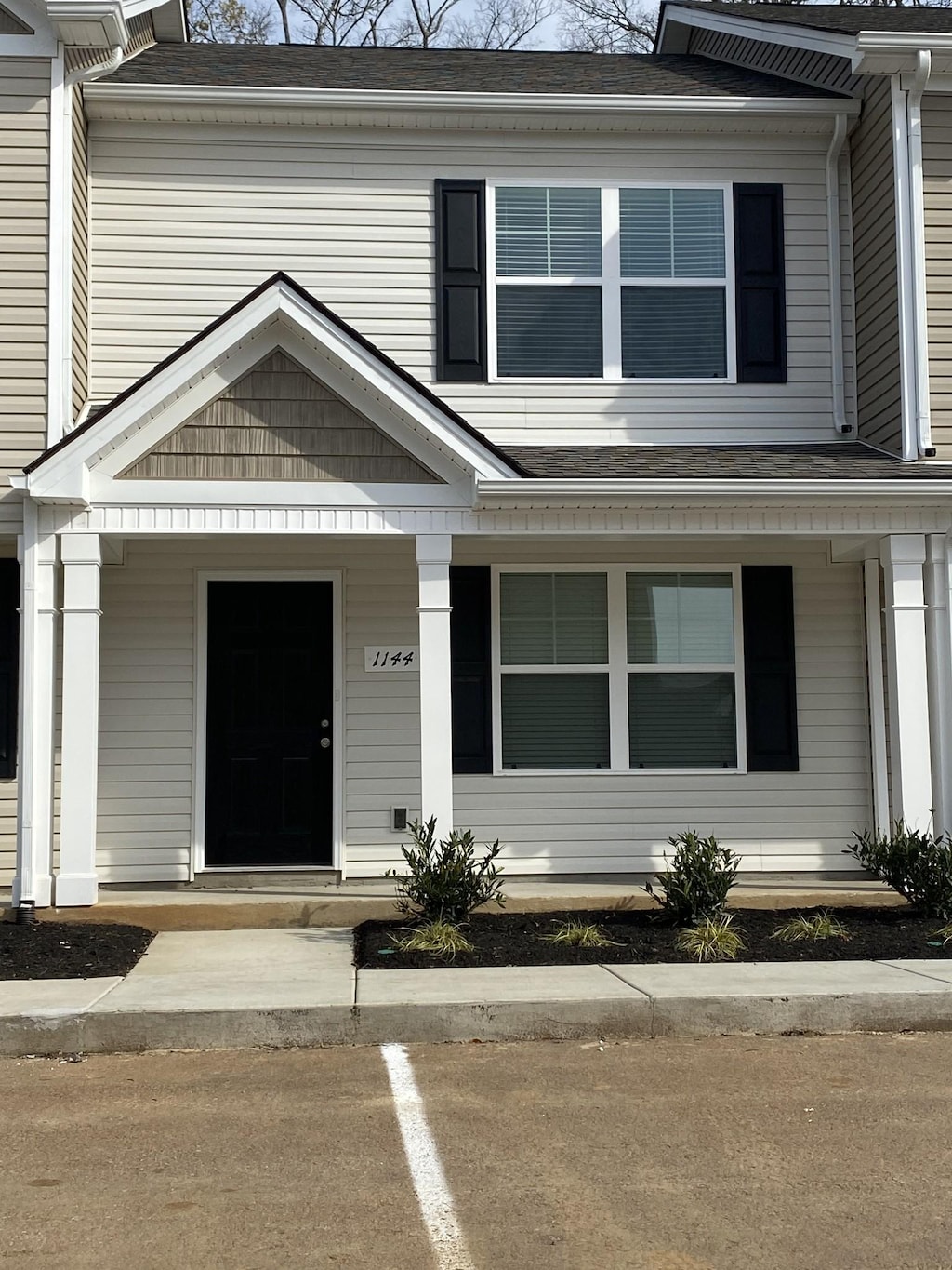 1144 Tradition Trl Unit 52, Murfreesboro, TN 37130 - view of front facade featuring covered porch