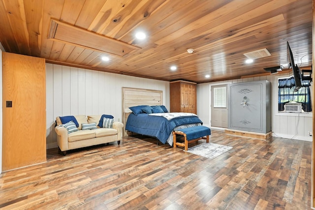 1880 Clydeton Rd, Waverly, TN 37185 - bedroom featuring wood finished floors, wooden ceiling, wood walls, cooling unit, and recessed lighting