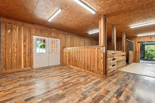 1880 Clydeton Rd, Waverly, TN 37185 - foyer entrance featuring wooden walls and hardwood / wood-style floors