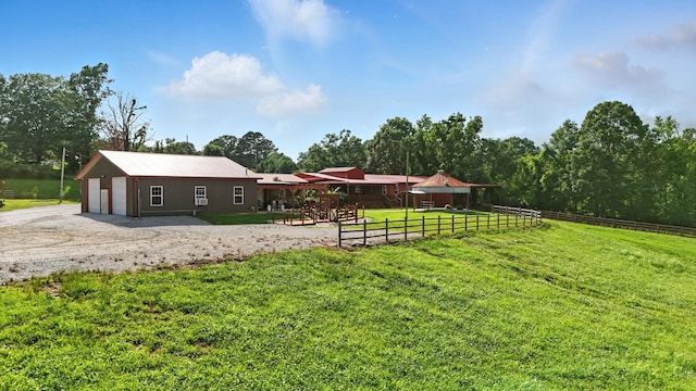 1880 Clydeton Rd, Waverly, TN 37185 - view of yard featuring an outdoor structure and a detached garage