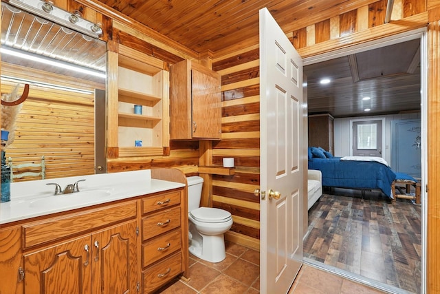 1880 Clydeton Rd, Waverly, TN 37185 - bathroom with vanity, wooden ceiling, wooden walls, and tile patterned floors