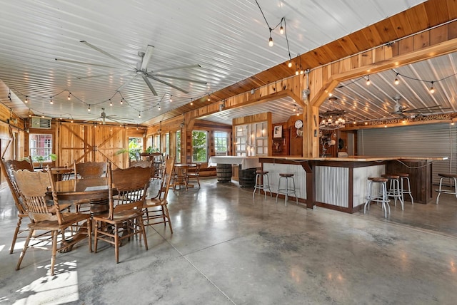 1880 Clydeton Rd, Waverly, TN 37185 - dining space featuring finished concrete floors and a dry bar