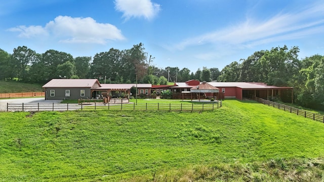 1880 Clydeton Rd, Waverly, TN 37185 - view of yard featuring an exterior structure, an outdoor structure, an outdoor riding arena, and a view of rural / pastoral area