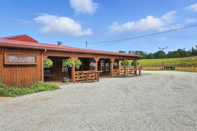 1880 Clydeton Rd, Waverly, TN 37185 - view of front facade with a metal roof