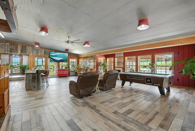 1880 Clydeton Rd, Waverly, TN 37185 - game room featuring wooden walls, lofted ceiling, wood-type flooring, healthy amount of natural light, and billiards table