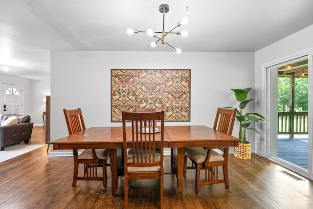1207 Trotwood Ave, Columbia, TN 38401 - dining area with a chandelier and wood finished floors