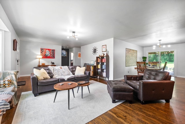 1207 Trotwood Ave, Columbia, TN 38401 - living area with dark wood-style floors and a chandelier