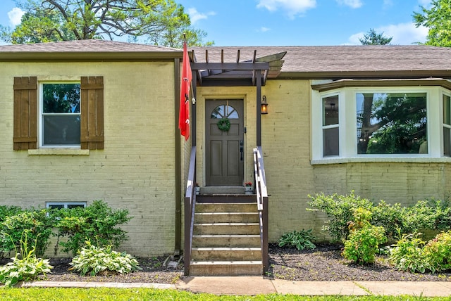 1207 Trotwood Ave, Columbia, TN 38401 - doorway to property with brick siding and a pergola