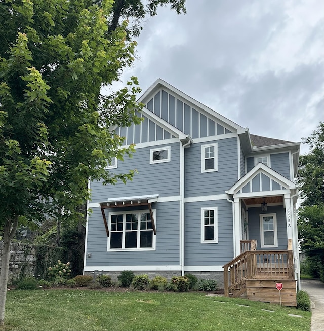 2229A 11th Ave S, Nashville, TN 37204 - view of front of property featuring a front yard and board and batten siding