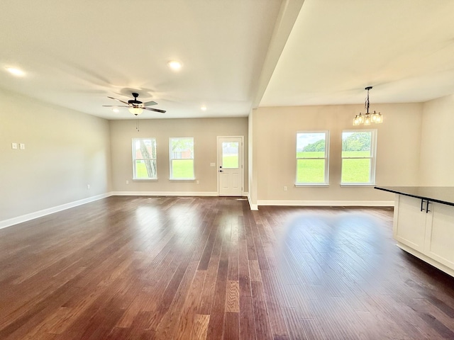 65 Misty Ln, Castalian Springs, TN 37031 - unfurnished living room featuring ceiling fan, dark wood-type flooring, a chandelier, and recessed lighting