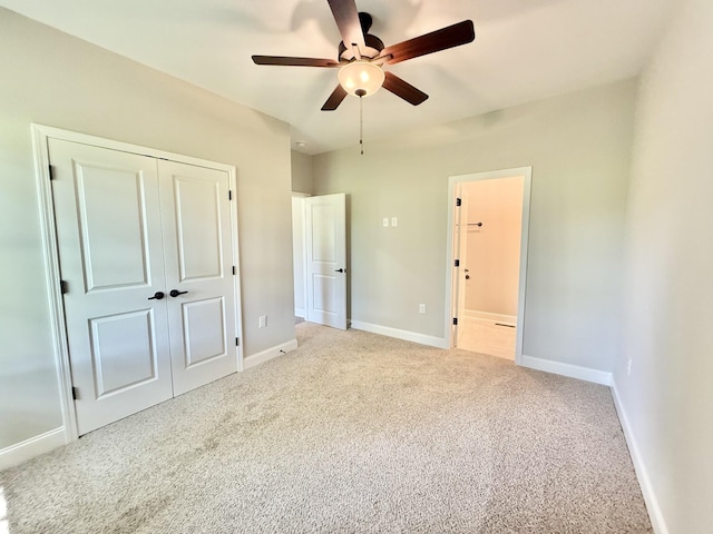 65 Misty Ln, Castalian Springs, TN 37031 - unfurnished bedroom with light colored carpet, a closet, and a ceiling fan