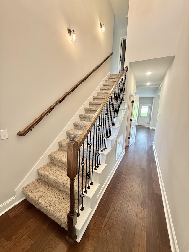 65 Misty Ln, Castalian Springs, TN 37031 - stairway featuring hardwood / wood-style flooring and a towering ceiling
