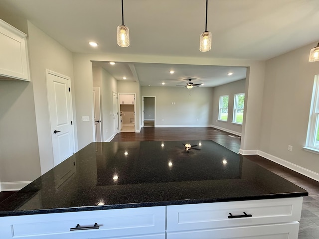 65 Misty Ln, Castalian Springs, TN 37031 - kitchen with a ceiling fan, recessed lighting, white cabinets, dark stone countertops, and a large island