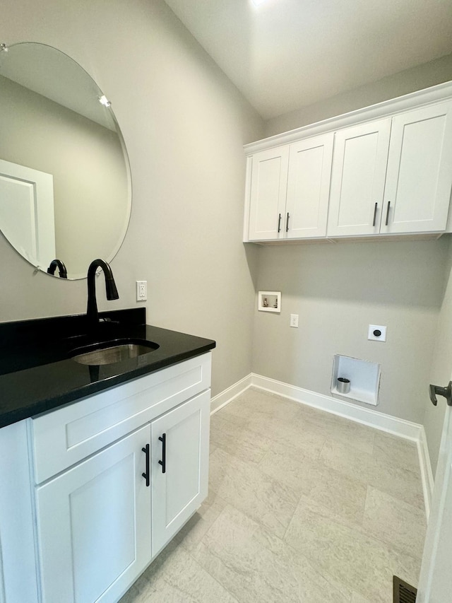 65 Misty Ln, Castalian Springs, TN 37031 - laundry area featuring cabinet space, electric dryer hookup, and washer hookup