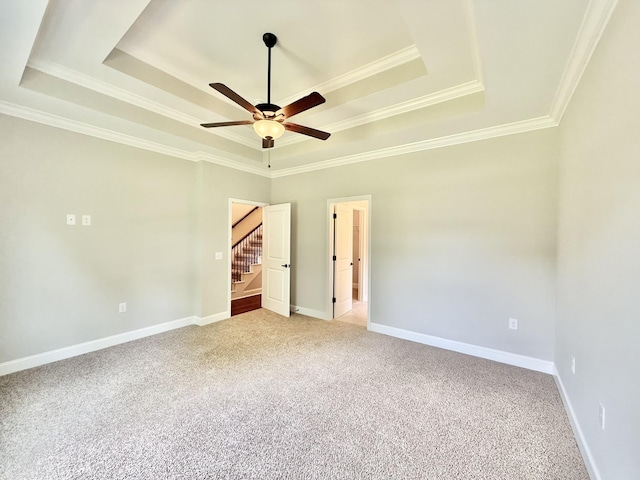 65 Misty Ln, Castalian Springs, TN 37031 - unfurnished bedroom featuring a raised ceiling, crown molding, light carpet, and a ceiling fan