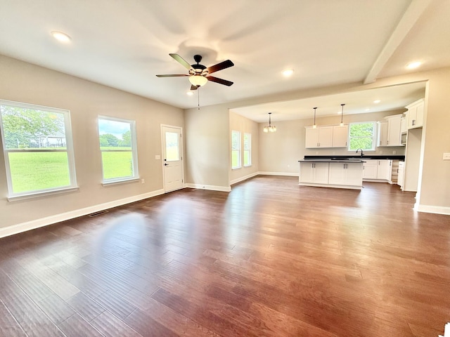 65 Misty Ln, Castalian Springs, TN 37031 - unfurnished living room with dark wood finished floors, recessed lighting, ceiling fan, and a chandelier