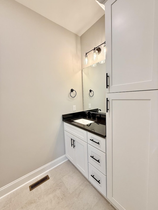 65 Misty Ln, Castalian Springs, TN 37031 - bathroom featuring baseboards and vanity