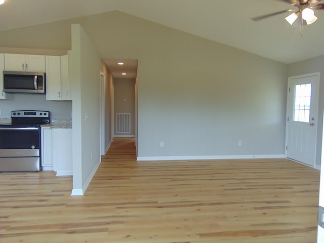 369 Brace Loop, Summertown, TN 38483 - kitchen with appliances with stainless steel finishes, lofted ceiling, light wood-type flooring, white cabinets, and a ceiling fan